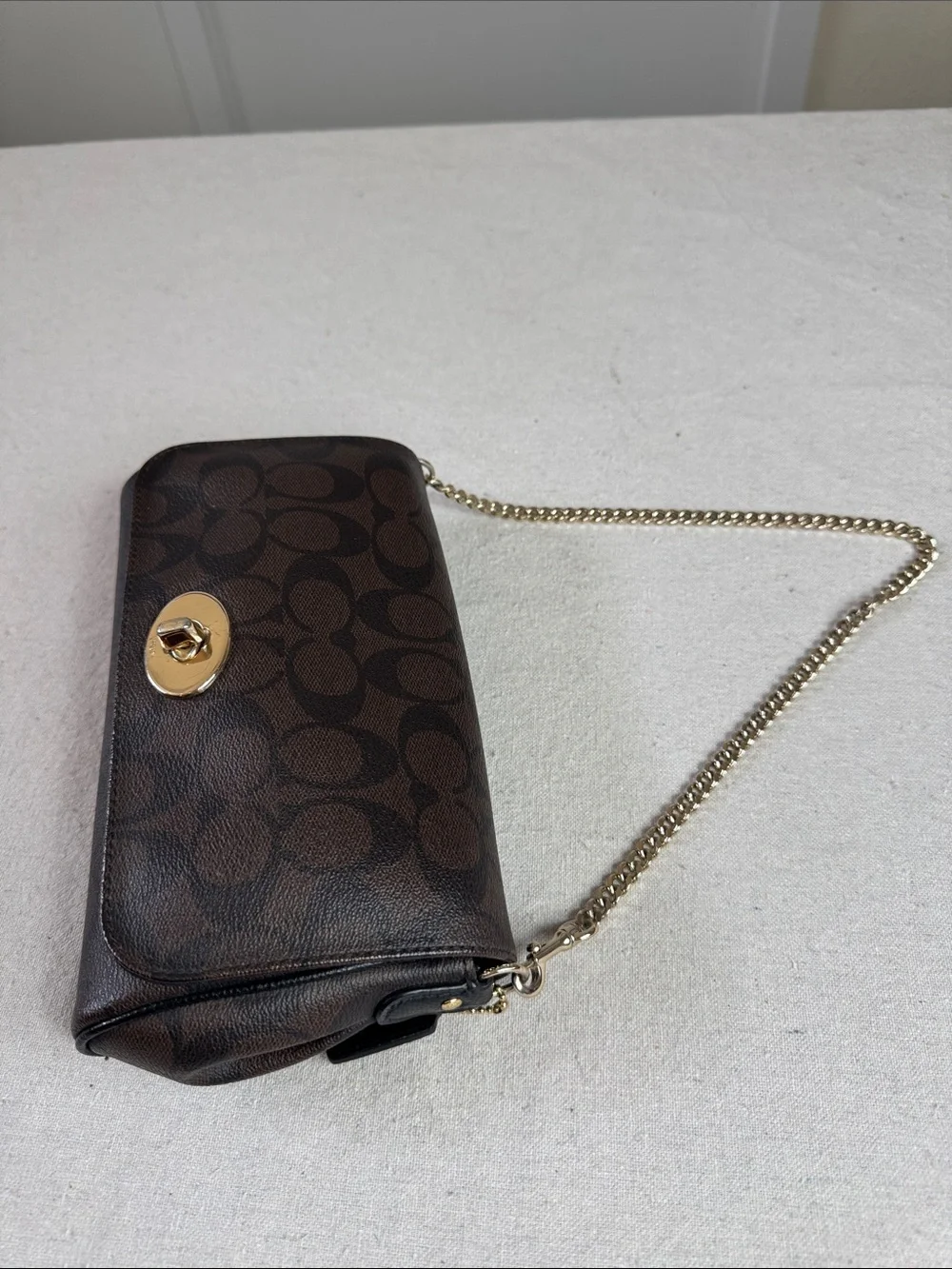 Coach Brown Signature Ruby Mini Crossbody with Gold Hardware bag.
